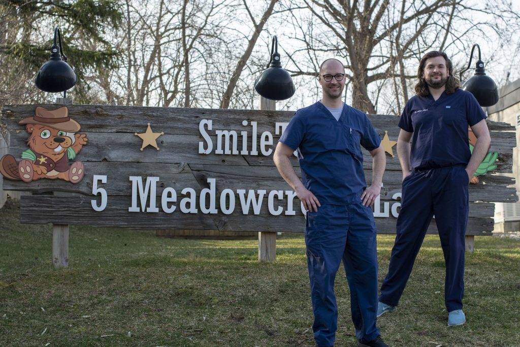 SmileTown owners Dr. Campbell and Dr. Adams